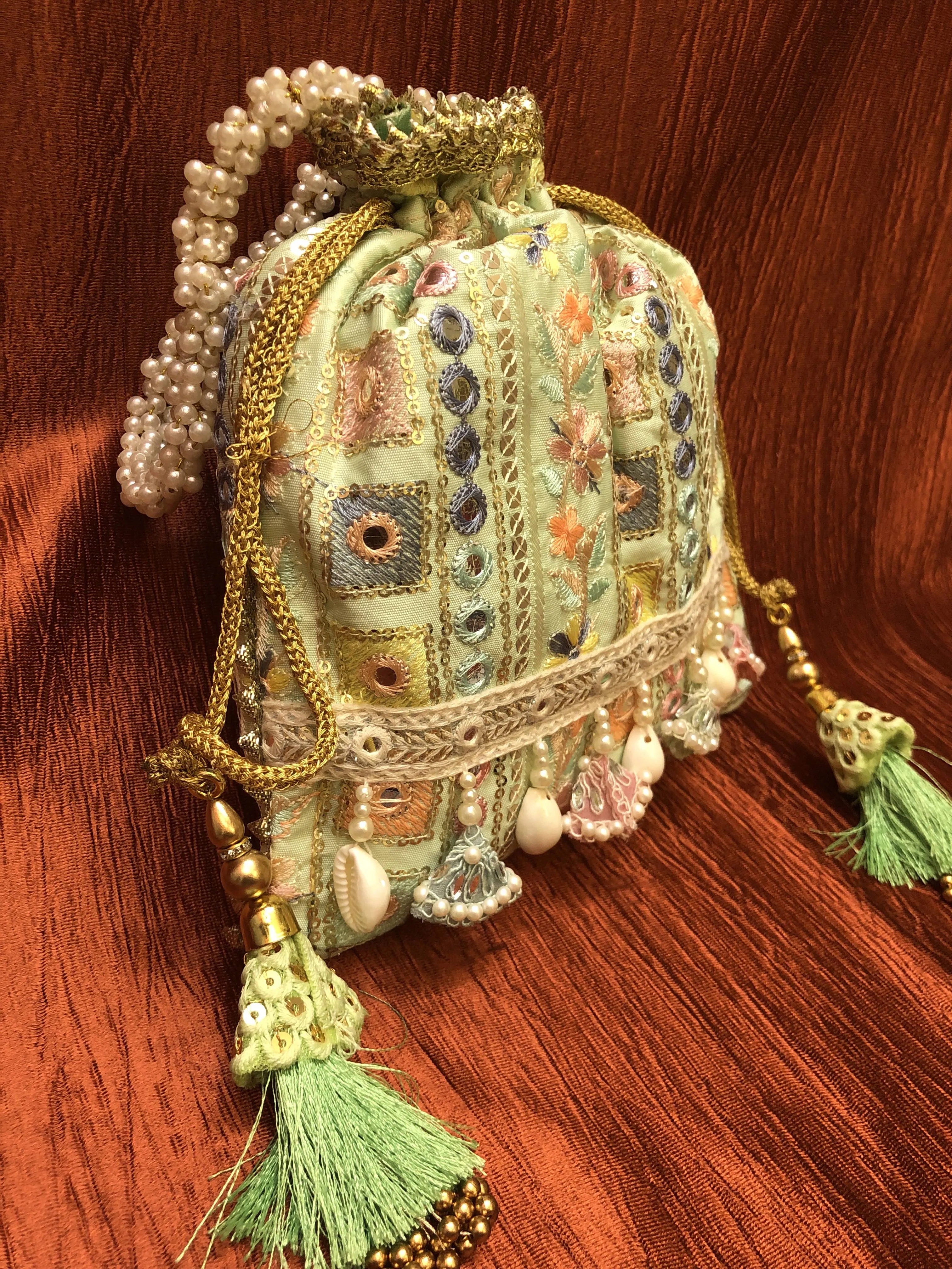 Light Green Color Potli Clutch Bag with Embroidery & Mirror Work